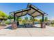 Covered picnic pavilion with tables, benches, and grills at 3714 S 58 Dr, Phoenix, AZ 85043