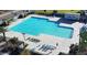 Community swimming pool with lounge chairs at 3714 S 58 Dr, Phoenix, AZ 85043