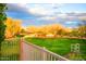 Well-maintained community green space behind the home at 2116 N 81St Cir, Mesa, AZ 85207