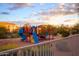 Neighborhood playground featuring slide and climbing structures at 2116 N 81St Cir, Mesa, AZ 85207