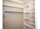 Walk-in closet with custom shelving at 2116 N 81St Cir, Mesa, AZ 85207