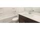 Clean bathroom with tub, shower, toilet, and modern vanity at 2668 E San Miguel Dr, Casa Grande, AZ 85194