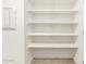 Large pantry with ample shelving for storage at 36958 W Prado St, Maricopa, AZ 85138