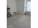 Bedroom or bonus room with neutral carpet, and a well-lit space at 402 W Grandview Rd, Phoenix, AZ 85023