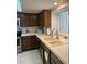 Clean kitchen featuring stainless steel appliances, a large sink, and stylish countertops at 402 W Grandview Rd, Phoenix, AZ 85023