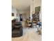 Open-concept living and dining area with hardwood floors and ample natural light at 402 W Grandview Rd, Phoenix, AZ 85023