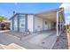 Single story home featuring carport, desert landscaping, and easy access at 11275 N 99Th Ave # 145, Peoria, AZ 85345
