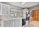 Well-maintained kitchen with white cabinets, modern appliances, and functional layout at 11275 N 99Th Ave # 145, Peoria, AZ 85345