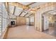 Cozy living room featuring wood paneling, fireplace and open floor plan at 11275 N 99Th Ave # 145, Peoria, AZ 85345