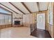 Inviting living room featuring fireplace, wood paneling and lots of natural light at 11275 N 99Th Ave # 145, Peoria, AZ 85345
