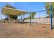 Neighborhood playground with swings, climbing dome, and covered picnic area at 11275 N 99Th Ave # 145, Peoria, AZ 85345