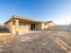 The backyard is spacious and ready for landscaping at 22455 W Pontiac Dr, Surprise, AZ 85387