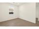 This bedroom features hardwood floors and a window letting in natural light at 22455 W Pontiac Dr, Surprise, AZ 85387