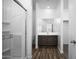 Bathroom featuring a glass enclosed shower, modern vanity, and tile flooring at 24592 W St Anne Ave, Buckeye, AZ 85326
