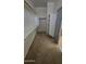 Walk-in closet featuring built-in shelving and ample storage space at 43603 N 44Th Ln, Phoenix, AZ 85087