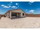 View of the back exterior of the home and the large backyard at 18532 E Dario Rd, Gold Canyon, AZ 85118