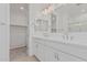 Modern bathroom with double sink vanity and walk-in closet at 18532 E Dario Rd, Gold Canyon, AZ 85118