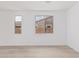 Bright bedroom with windows offering natural light and neutral-toned walls at 18532 E Dario Rd, Gold Canyon, AZ 85118