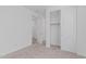 Bedroom with neutral colored carpet, closet and doorway at 18532 E Dario Rd, Gold Canyon, AZ 85118