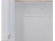 View of wooden hanging rail inside a closet with a white door at 18532 E Dario Rd, Gold Canyon, AZ 85118