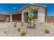 Attractive single-story home featuring desert-friendly landscaping and a covered entry at 18532 E Dario Rd, Gold Canyon, AZ 85118