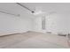 Large garage with automatic door opener, and white walls at 18532 E Dario Rd, Gold Canyon, AZ 85118