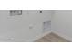 White wall of a laundry room with water and dryer hookups at 18532 E Dario Rd, Gold Canyon, AZ 85118