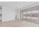 Bright living space with sliding glass doors and open access to the kitchen at 18532 E Dario Rd, Gold Canyon, AZ 85118