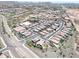 Expansive aerial view of a Primary-planned community featuring desert landscaping and tile-roofed homes at 10637 W Eucalyptus Rd, Peoria, AZ 85383