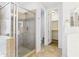 Bright bathroom with glass enclosed shower and walk-in closet at 10637 W Eucalyptus Rd, Peoria, AZ 85383
