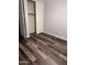 Bedroom with wood flooring and walk-in closet at 10637 W Eucalyptus Rd, Peoria, AZ 85383