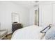 Comfortable bedroom featuring a ceiling fan, dresser, closet and natural light at 10637 W Eucalyptus Rd, Peoria, AZ 85383