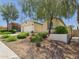 Attractive single-level home with desert landscaping, a two-car garage, and mature trees at 10637 W Eucalyptus Rd, Peoria, AZ 85383