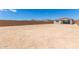View of spacious backyard, ready for landscaping and outdoor enjoyment at 18525 E Dario Rd, Gold Canyon, AZ 85118