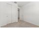 Neutral bedroom with closet and a door with a view to another room at 18525 E Dario Rd, Gold Canyon, AZ 85118