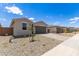 Street view of home's front exterior with xeriscaping at 18525 E Dario Rd, Gold Canyon, AZ 85118