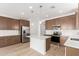 Bright kitchen features an island, stainless steel appliances, recessed lighting, and plenty of counter space at 18525 E Dario Rd, Gold Canyon, AZ 85118