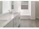 Bathroom featuring double sinks, tub, and shower at 37014 W La Paz St, Maricopa, AZ 85138
