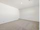 Cozy bedroom featuring neutral carpet and white walls, offering a blank canvas at 37014 W La Paz St, Maricopa, AZ 85138