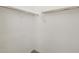 Well-organized closet with hanging rods providing space for storing apparel at 37014 W La Paz St, Maricopa, AZ 85138
