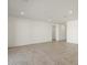 Open concept living room featuring recessed lighting and tiled flooring at 37014 W La Paz St, Maricopa, AZ 85138