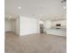 Open floorplan featuring a kitchen with stainless steel appliances and tile floors at 37014 W La Paz St, Maricopa, AZ 85138
