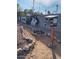 Backyard art gallery and path with rock landscaping at 1413 E Windsor Ave, Phoenix, AZ 85006