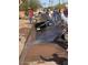 Curb and street preparation with community members working in the area at 1413 E Windsor Ave, Phoenix, AZ 85006