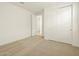Spacious bedroom with double door closet and carpeting at 37405 W San Clemente St, Maricopa, AZ 85138