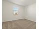 Simple bedroom with carpet and window at 37405 W San Clemente St, Maricopa, AZ 85138