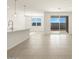 Open dining area with sliding glass doors to backyard at 37405 W San Clemente St, Maricopa, AZ 85138