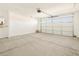 Attached garage with concrete flooring and automatic door at 37405 W San Clemente St, Maricopa, AZ 85138