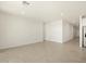 Spacious living room with tile flooring and lots of natural light at 37405 W San Clemente St, Maricopa, AZ 85138