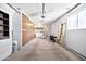Spacious garage with built-in shelving and cabinets, offering ample storage solutions at 10026 W Lancaster Dr, Sun City, AZ 85351